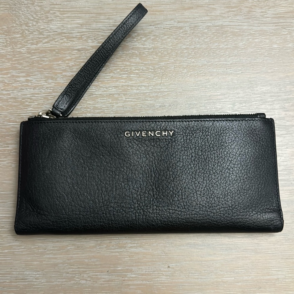 GIVENCHY
Black Pebbled Leather Wristlet Wallet